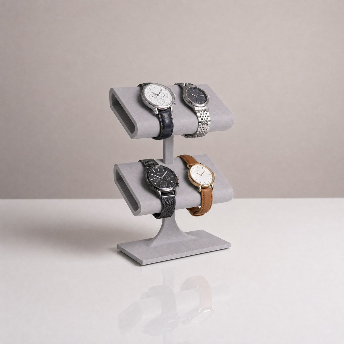 Quatro watch display stand in Stone grey holding four watches
