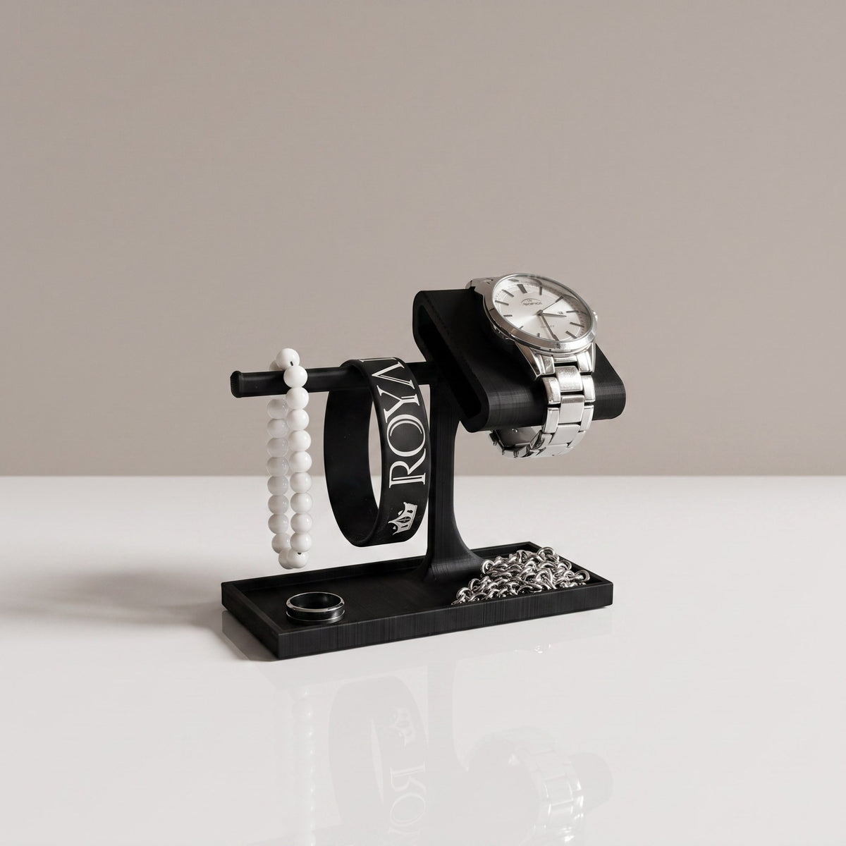 Valet Tray watch stand and jewellery organiser in Graphite with a watch, a bracelet and a ring tray