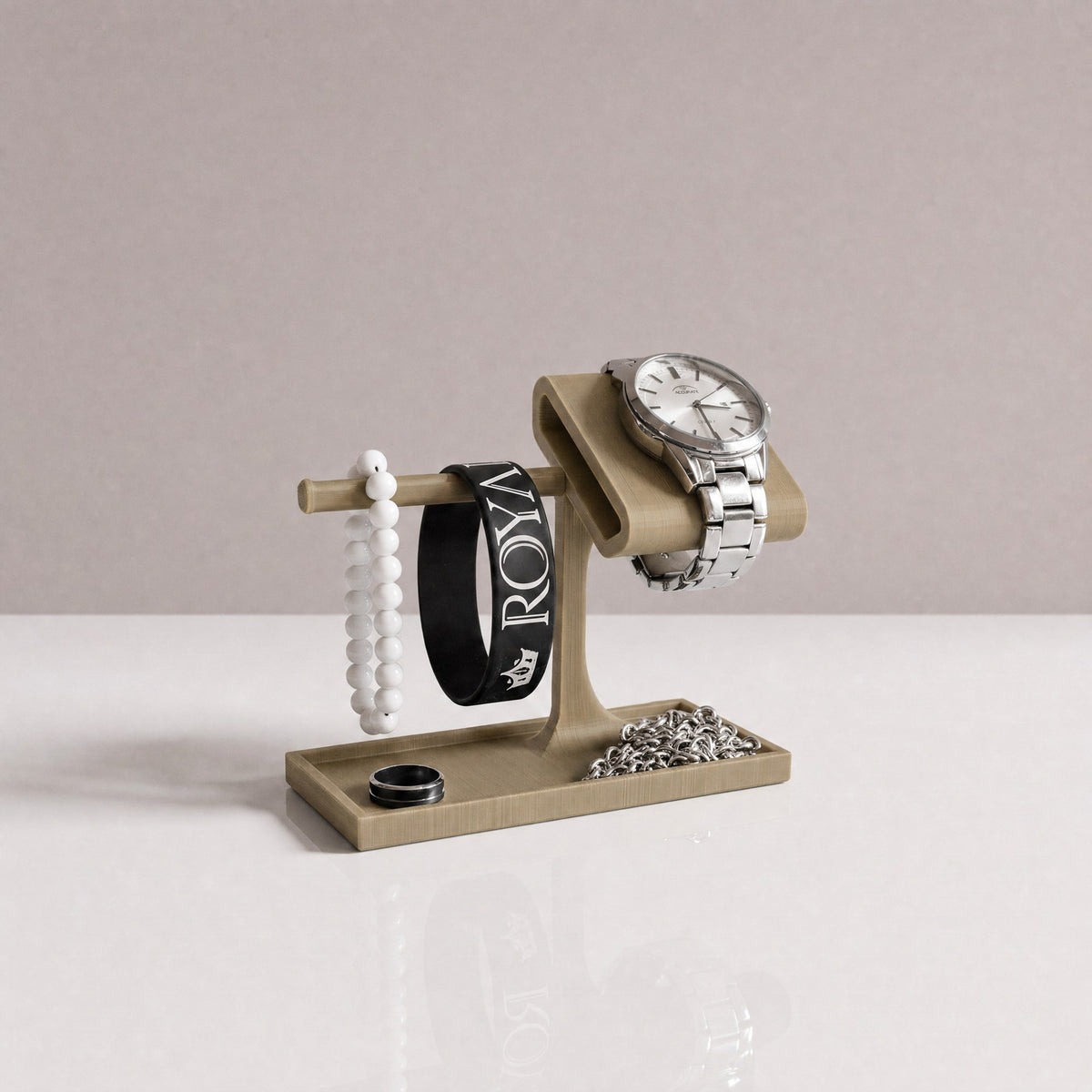 Valet Tray watch stand and jewellery organiser in Olive with a watch, a bracelet and a ring tray