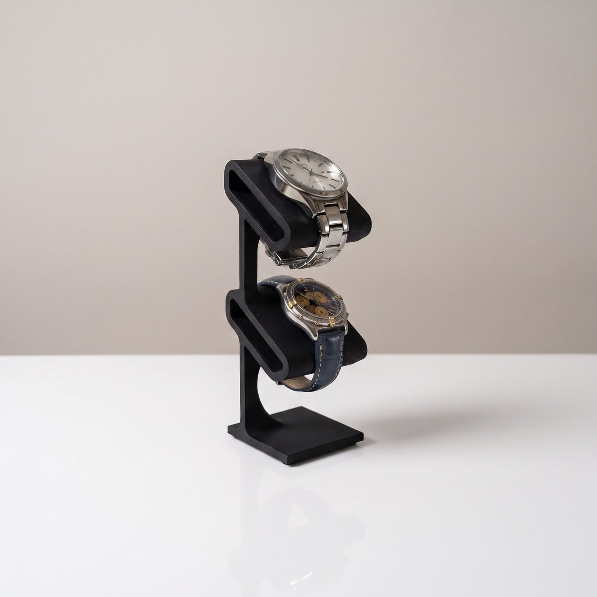 Duo two-tier watch stand in Graphite holding two watches