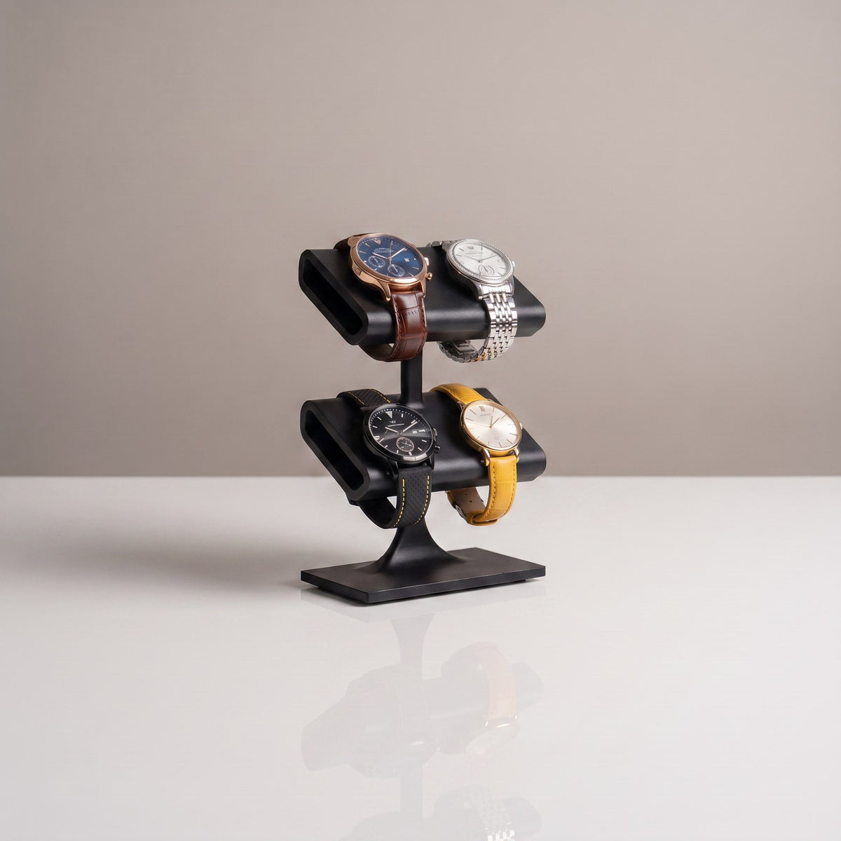 Quatro watch display stand in Graphite holding four watches