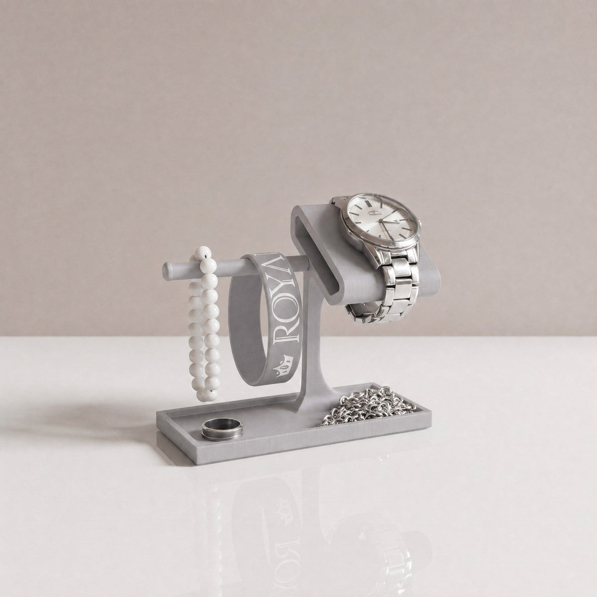 Valet Tray watch stand and jewellery organiser in Stone grey with a watch, a bracelet and a ring tray